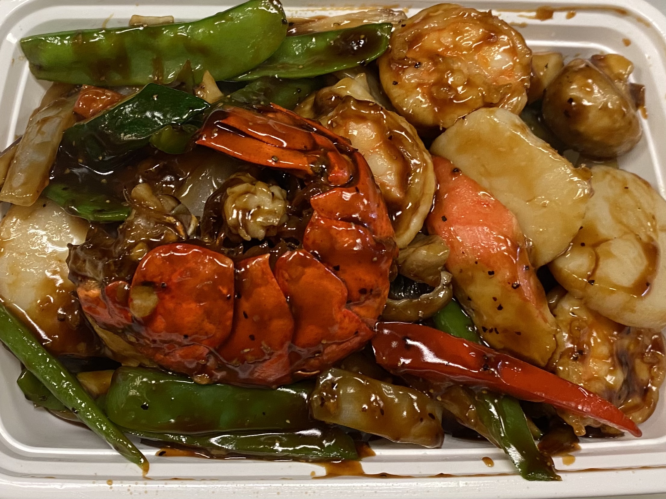 Order Seafood Sizzling Hot Plate吱吱热板海鲜 food online from Kumo Asian Fusion store, Brick on bringmethat.com