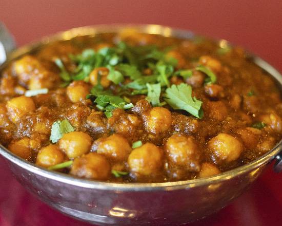 Order Channa Masala food online from Taj Indian Restaurant store, Nashville on bringmethat.com