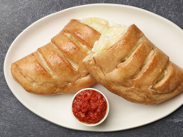 Order Three Cheese Calzone food online from Paisano's Pizza store, Brentsville on bringmethat.com