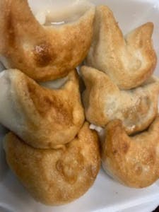Order AP7. Fried Meat Dumplings (6) food online from Peking Chef store, Fairfax Station on bringmethat.com