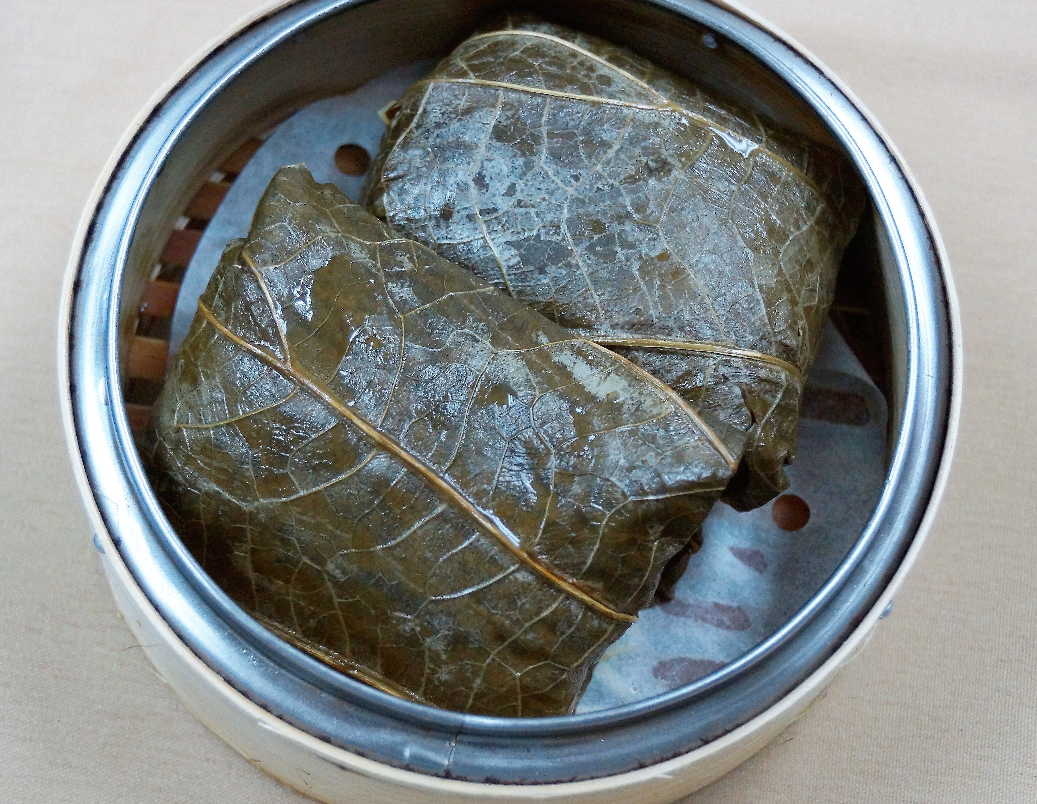 Order 22. Sticky Rice with Pork Wrapped in Lotus Leaf food online from Dim Sum Palace store, New York on bringmethat.com