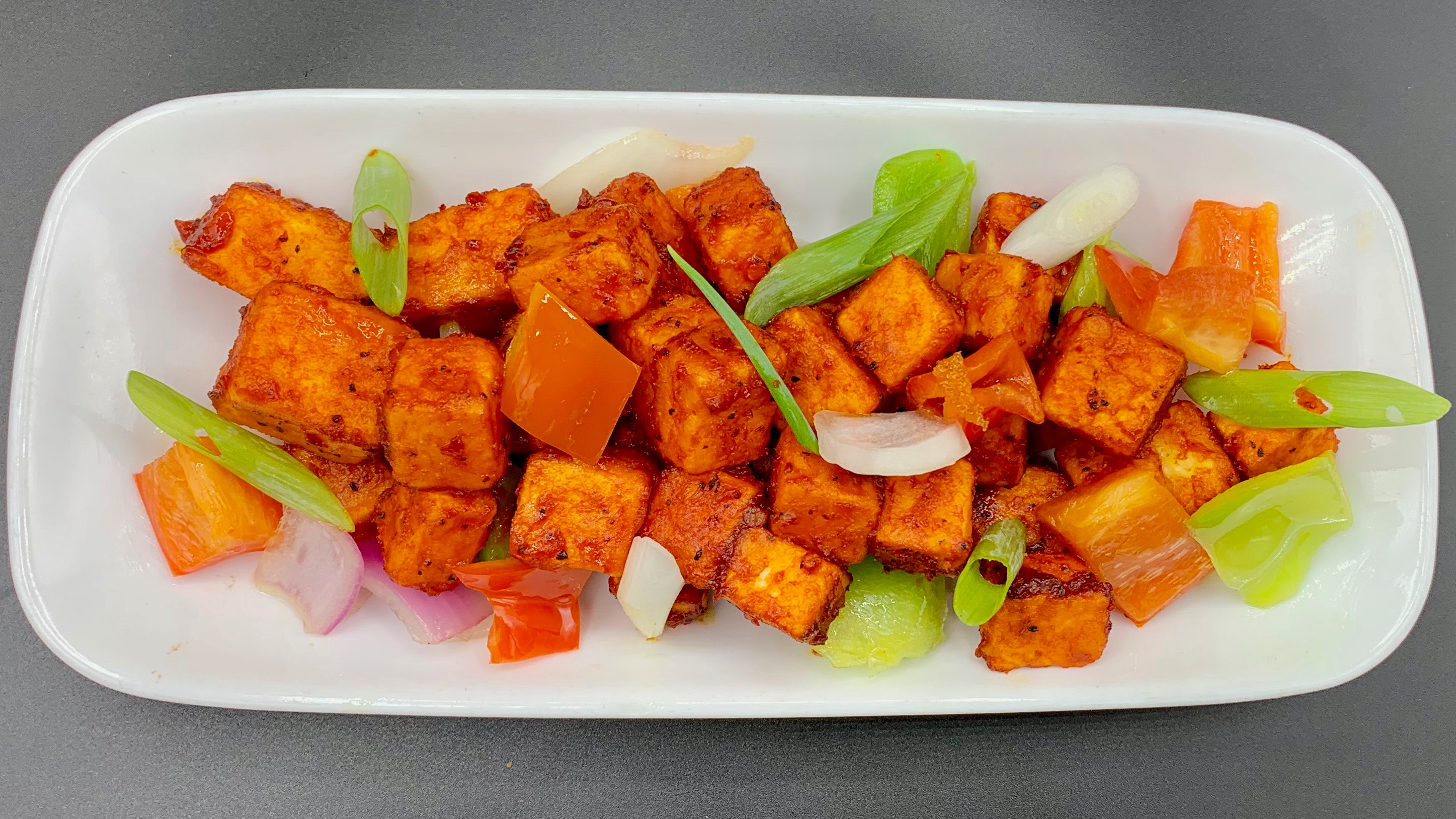 Order Chili Paneer food online from Masala Desi Cafe store, Burlingame on bringmethat.com