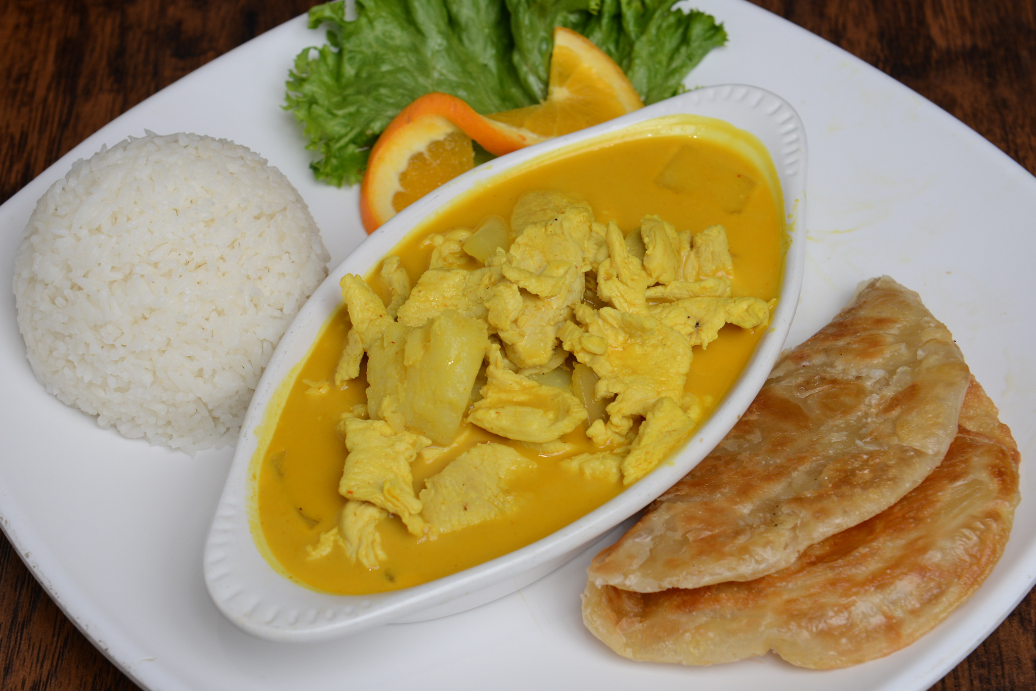 Order Famous Yellow Curry Chicken Combo Special food online from Rincome store, Northridge on bringmethat.com