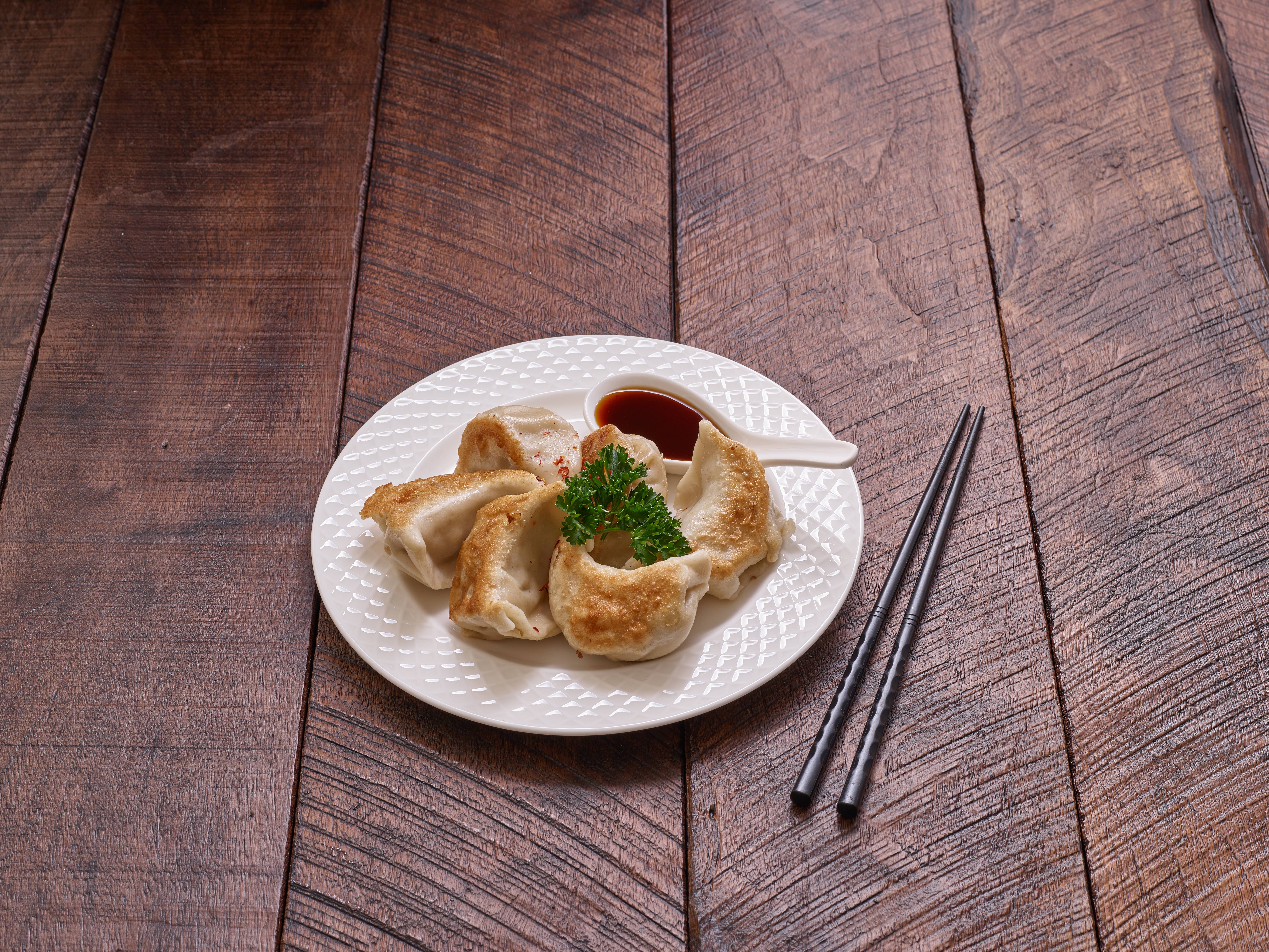 Order 2. Pot Sticker food online from Tea Cup House store, Sacramento on bringmethat.com