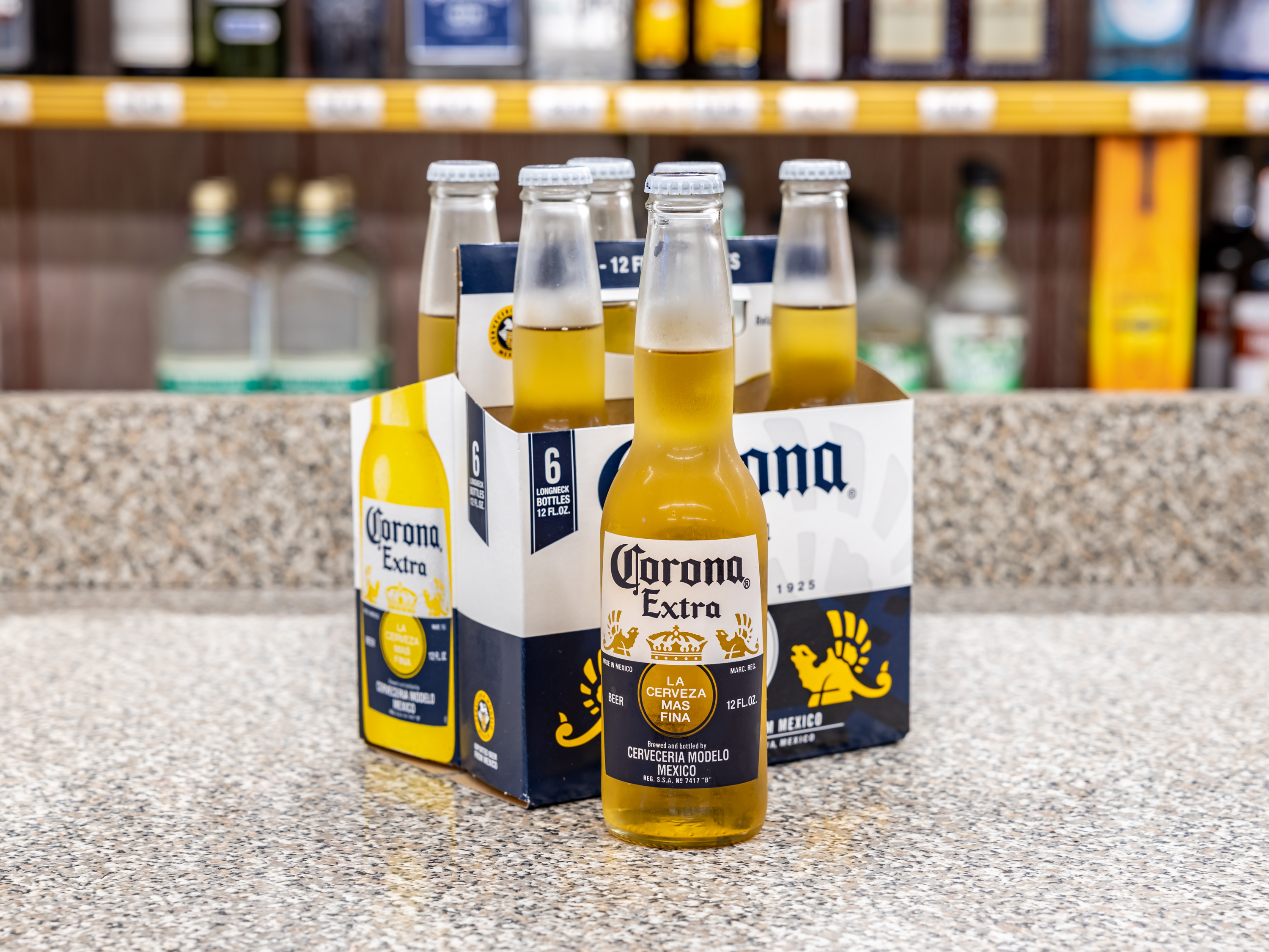 Order Corona, 6 Pack 12 oz. Bottle Beer 4.5% ABV food online from Liquor Republic store, Cypress on bringmethat.com