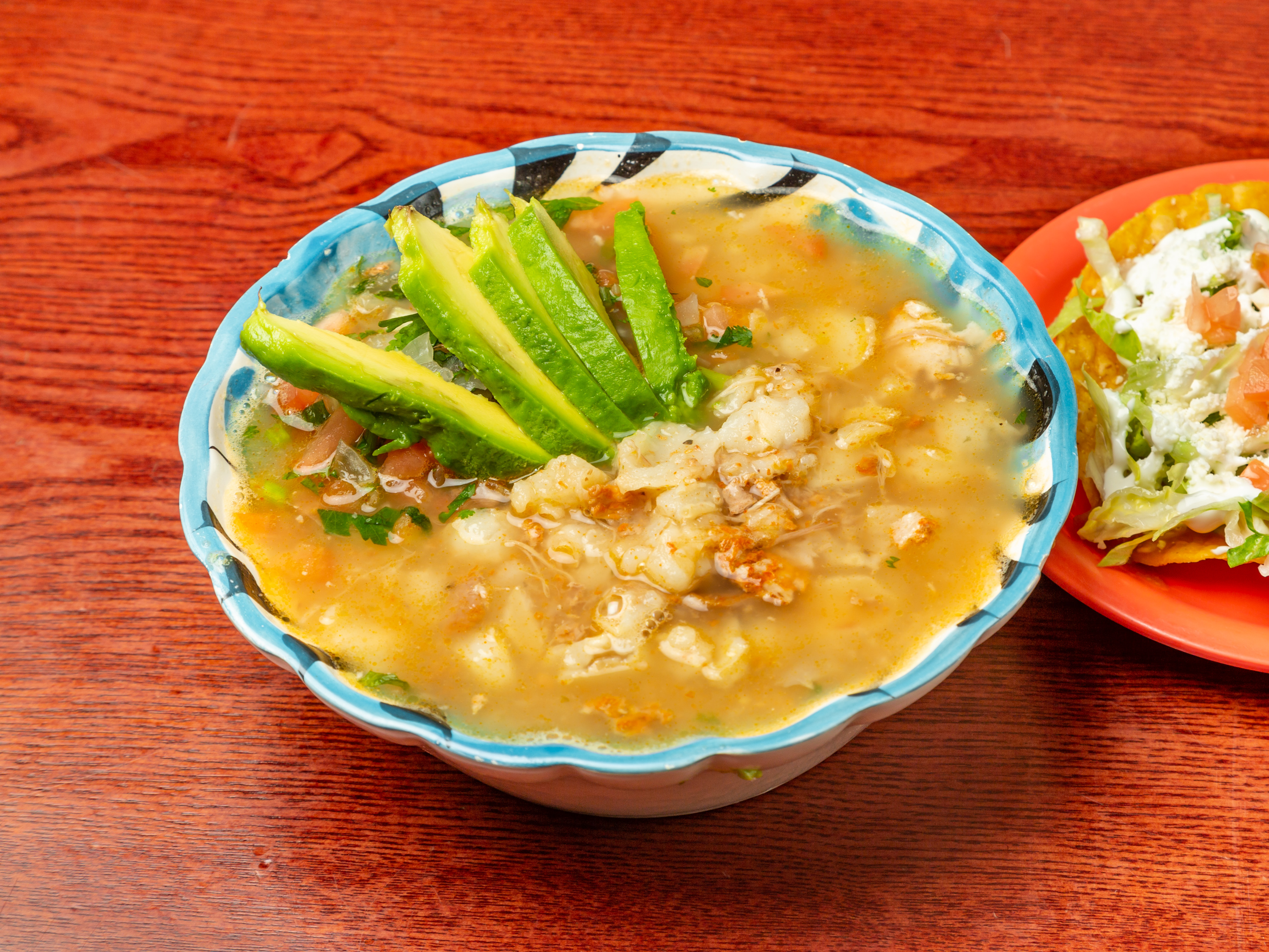 Order Pozole de Puerco food online from Picante Picante store, Bronx on bringmethat.com