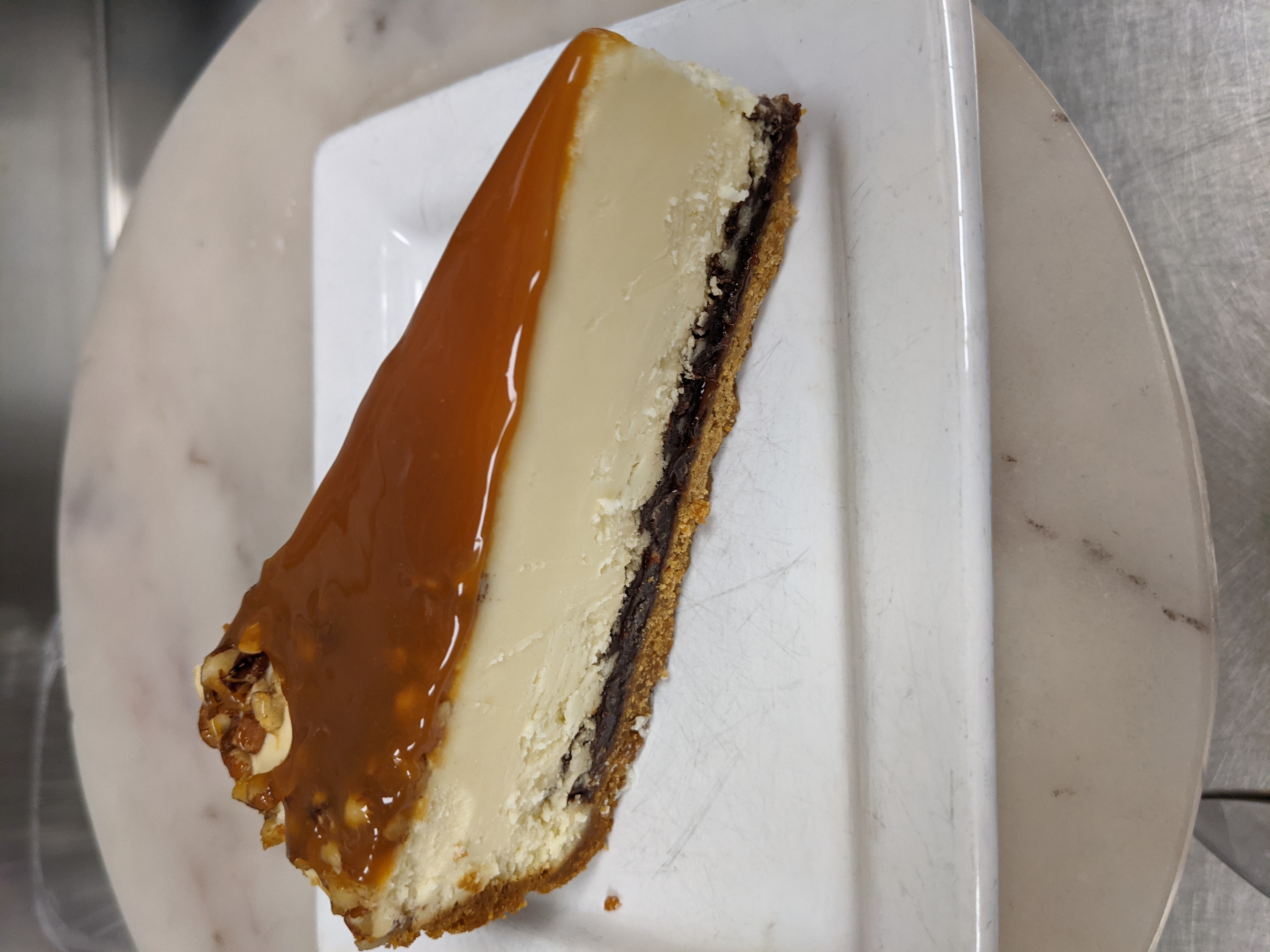 Order New York Turtle Cheesecake food online from MidiCi store, Orem on bringmethat.com
