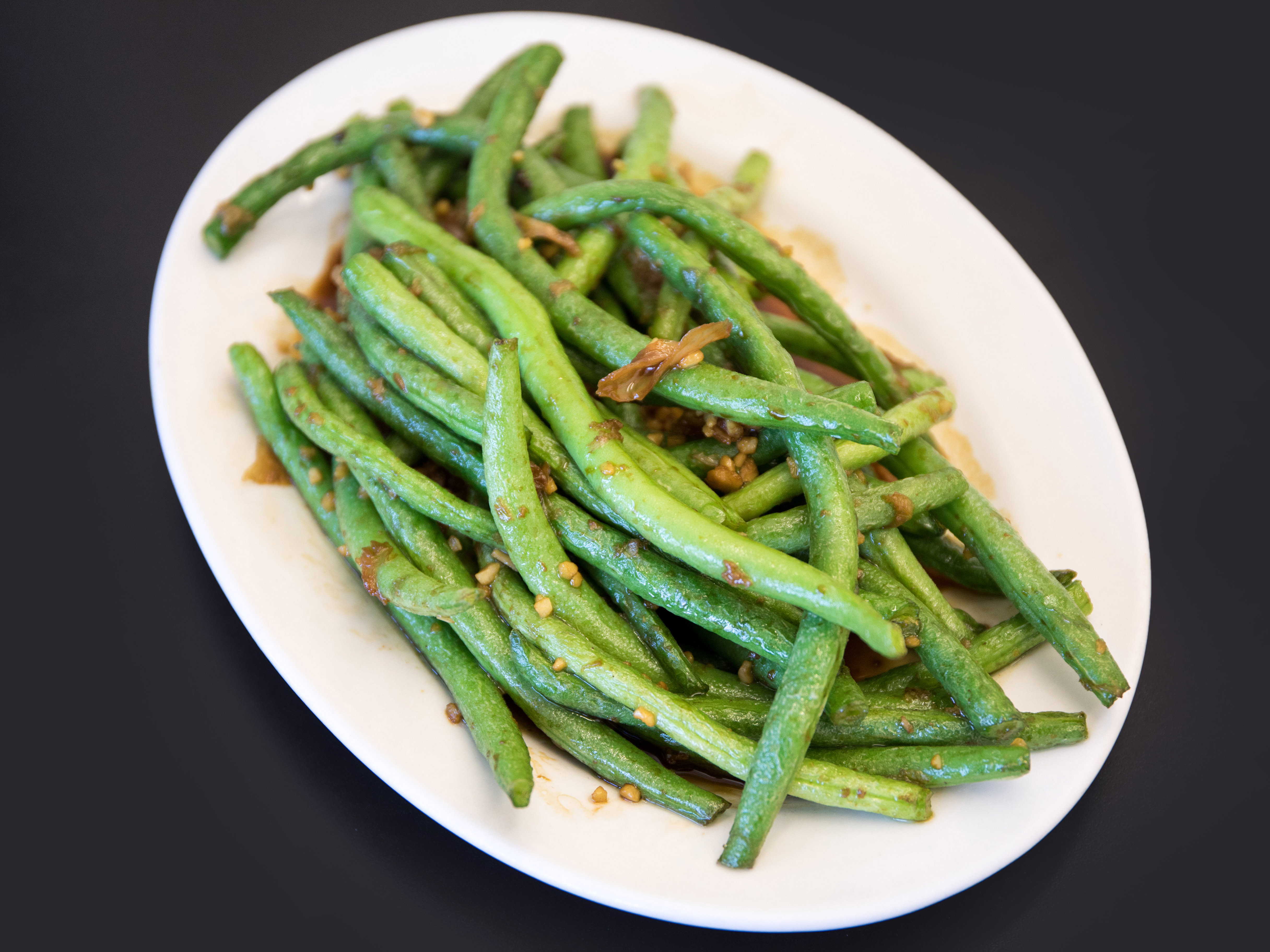 Order 干煸四季豆 Garlic String Beans food online from Dumpling Empire store, South San Francisco on bringmethat.com