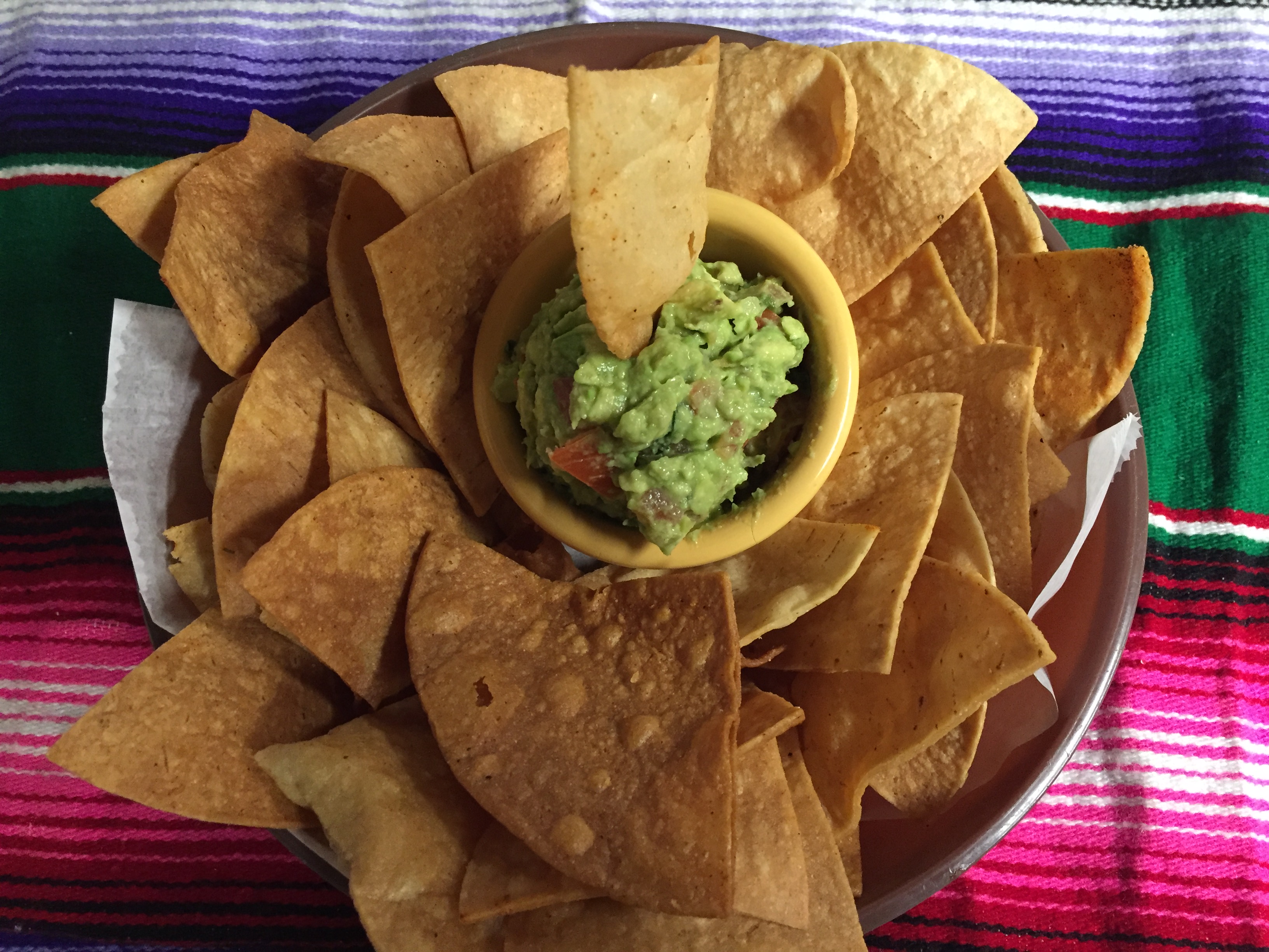 Order GUACAMOLE AND CHIPS food online from Montes Cafe store, Seaside Heights on bringmethat.com