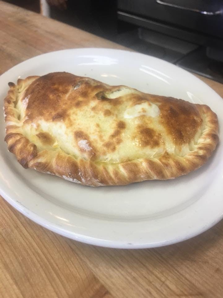 Order Calzone - Calzone food online from Stella's Pizza Kitchen store, La Canada on bringmethat.com