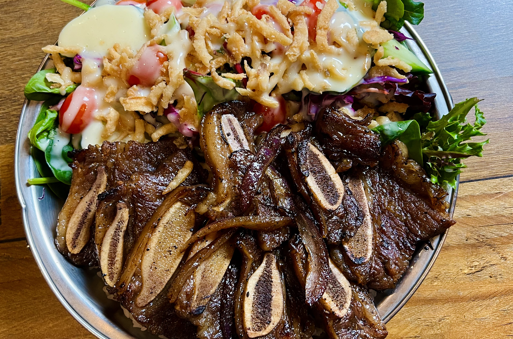 Order Beef Short Ribs with rice and salad food online from Bag O' Crab store, Salinas on bringmethat.com