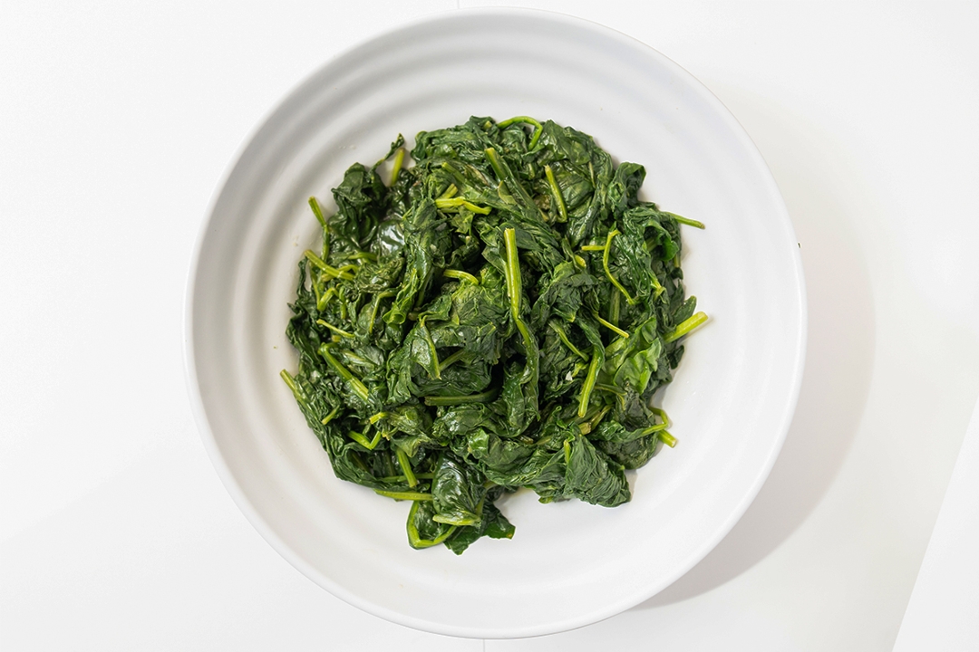 Order Single Side Steamed Spinach food online from Cafe Express store, Houston on bringmethat.com