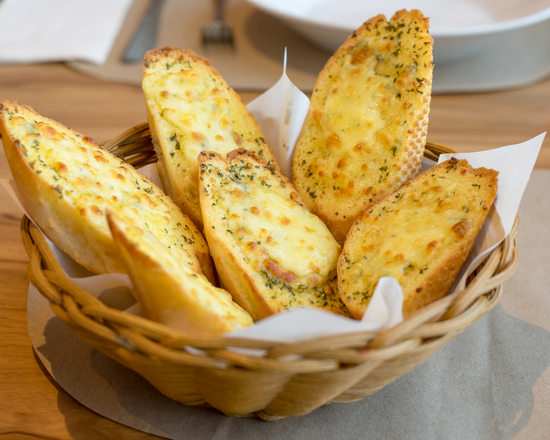 Order Garlic Bread with Cheese food online from Insomnia Buffalo Wings store, Las Vegas on bringmethat.com
