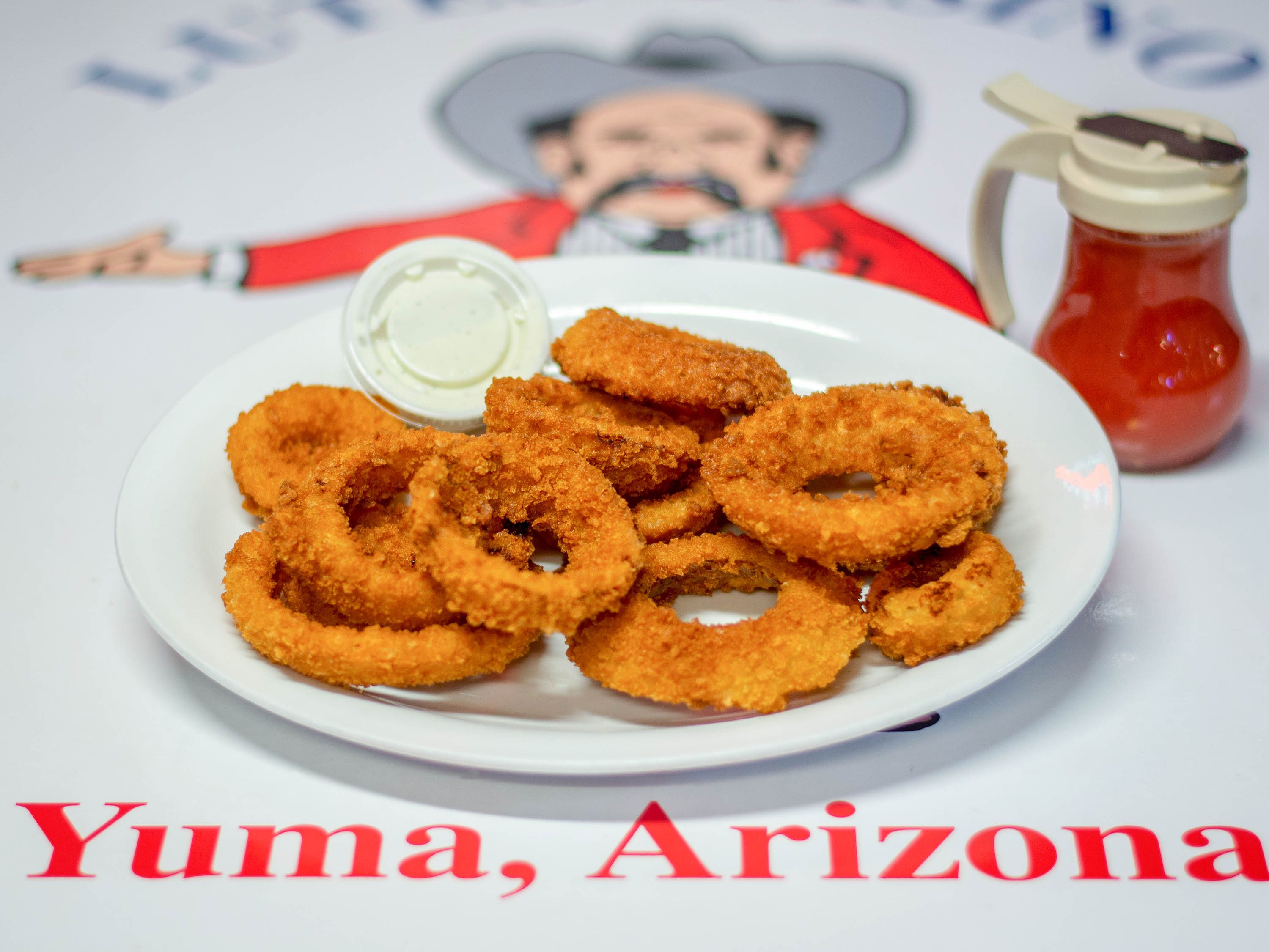 Order Onion Rings food online from Lutes' Casino store, Yuma on bringmethat.com