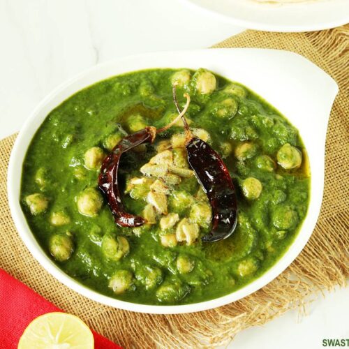 Order Chana Saag food online from Cosmo Indian Cafe store, Lawrence on bringmethat.com