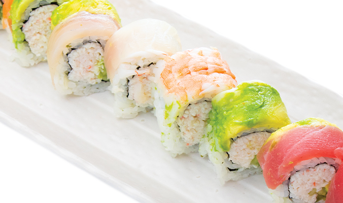 Order Rainbow roll - Raw food online from Oki Japanese Grill store, Plano on bringmethat.com