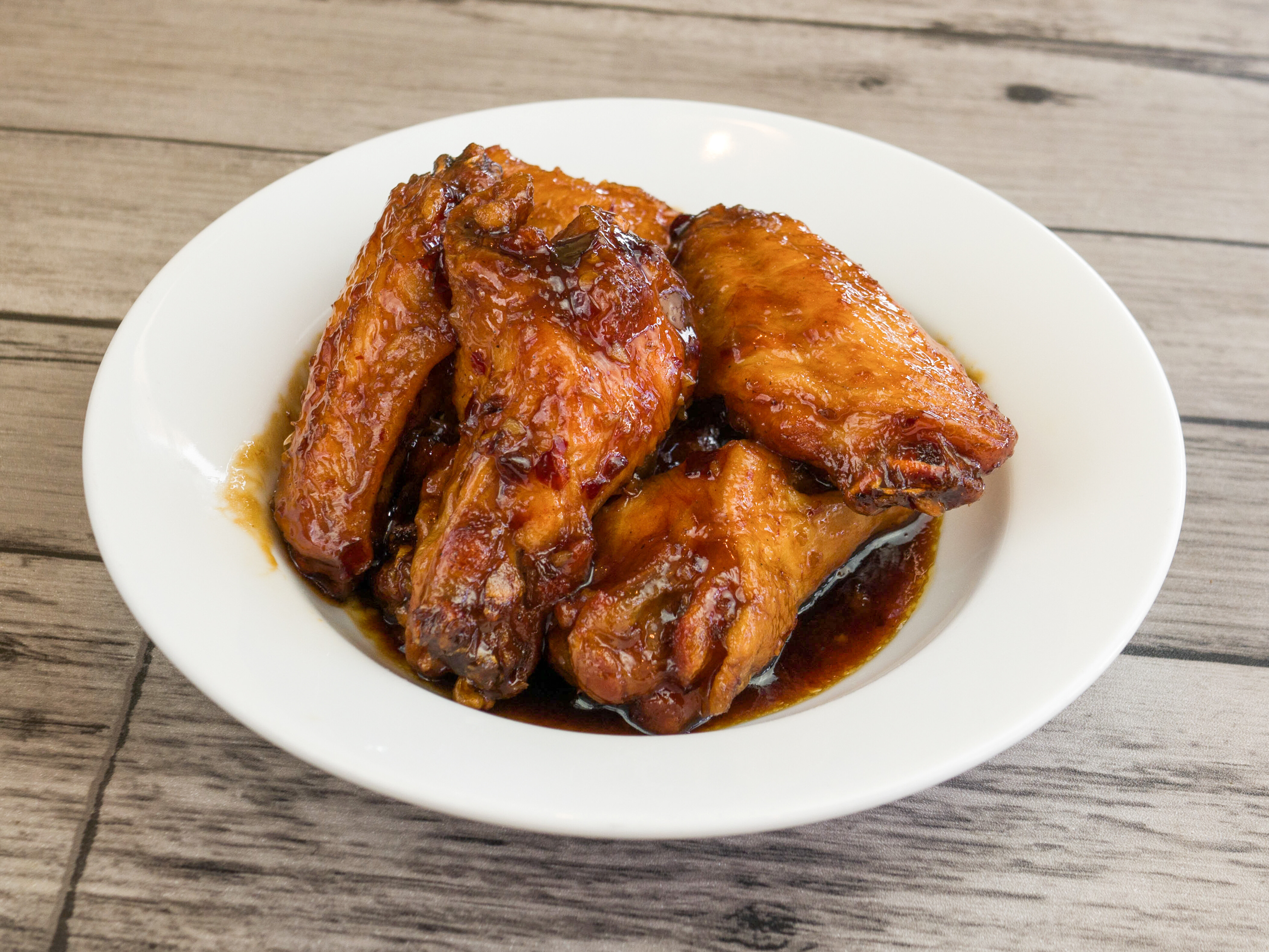 Order A20. Thai Tamarind Wings food online from Crazy Wok store, Houston on bringmethat.com