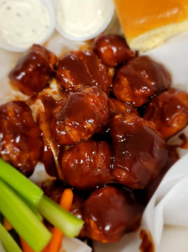 Order 12 Pieces Wing Basket food online from Chad store, Gladewater on bringmethat.com