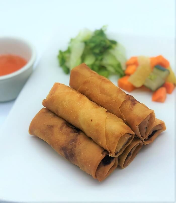 Order Imperial Chicken Egg Rolls (5pcs) food online from Kim Son Cafe  store, Houston on bringmethat.com
