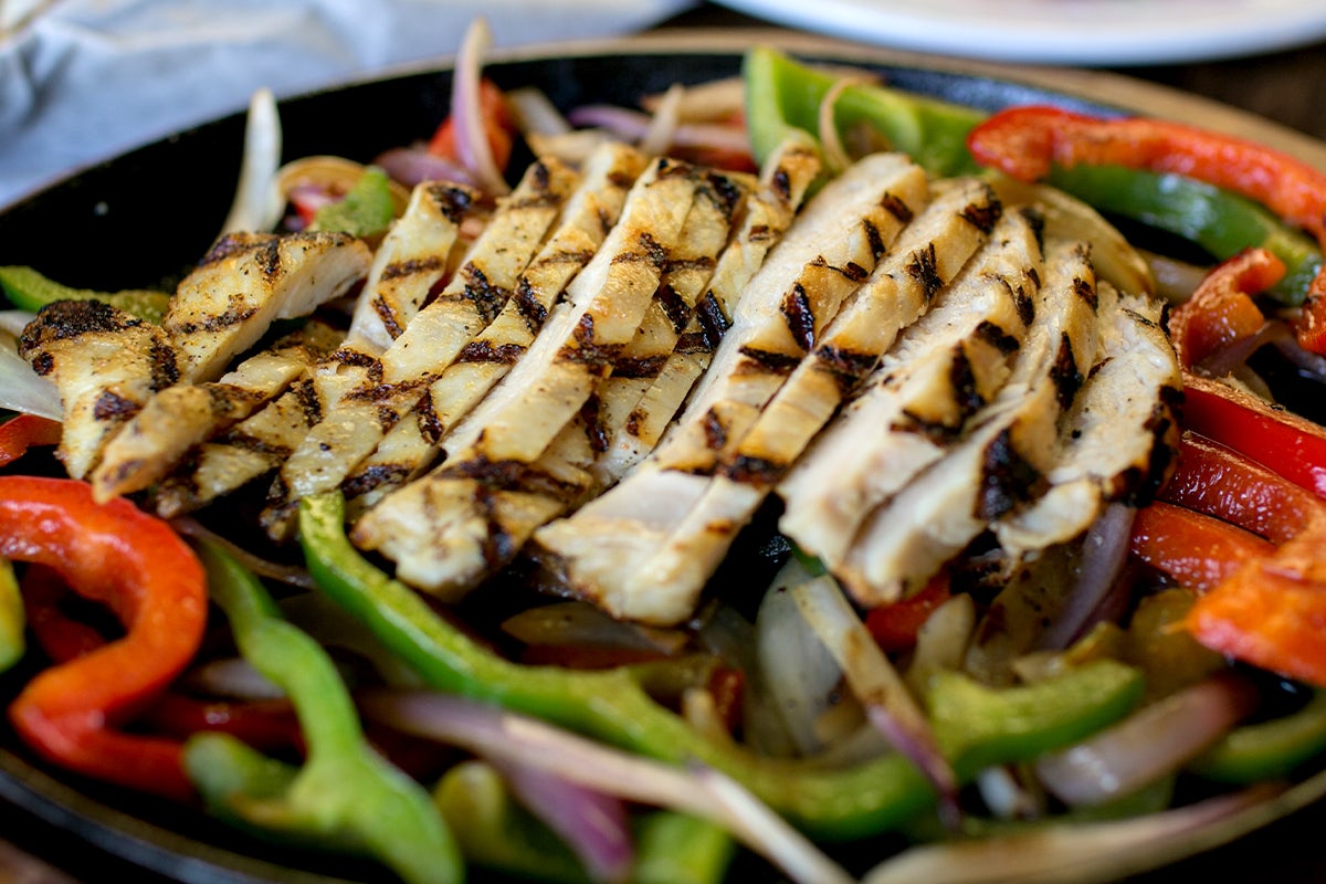 Order GRILLED MARINATED CHICKEN BREAST FAJITA food online from Miller Ale House store, Riverside on bringmethat.com