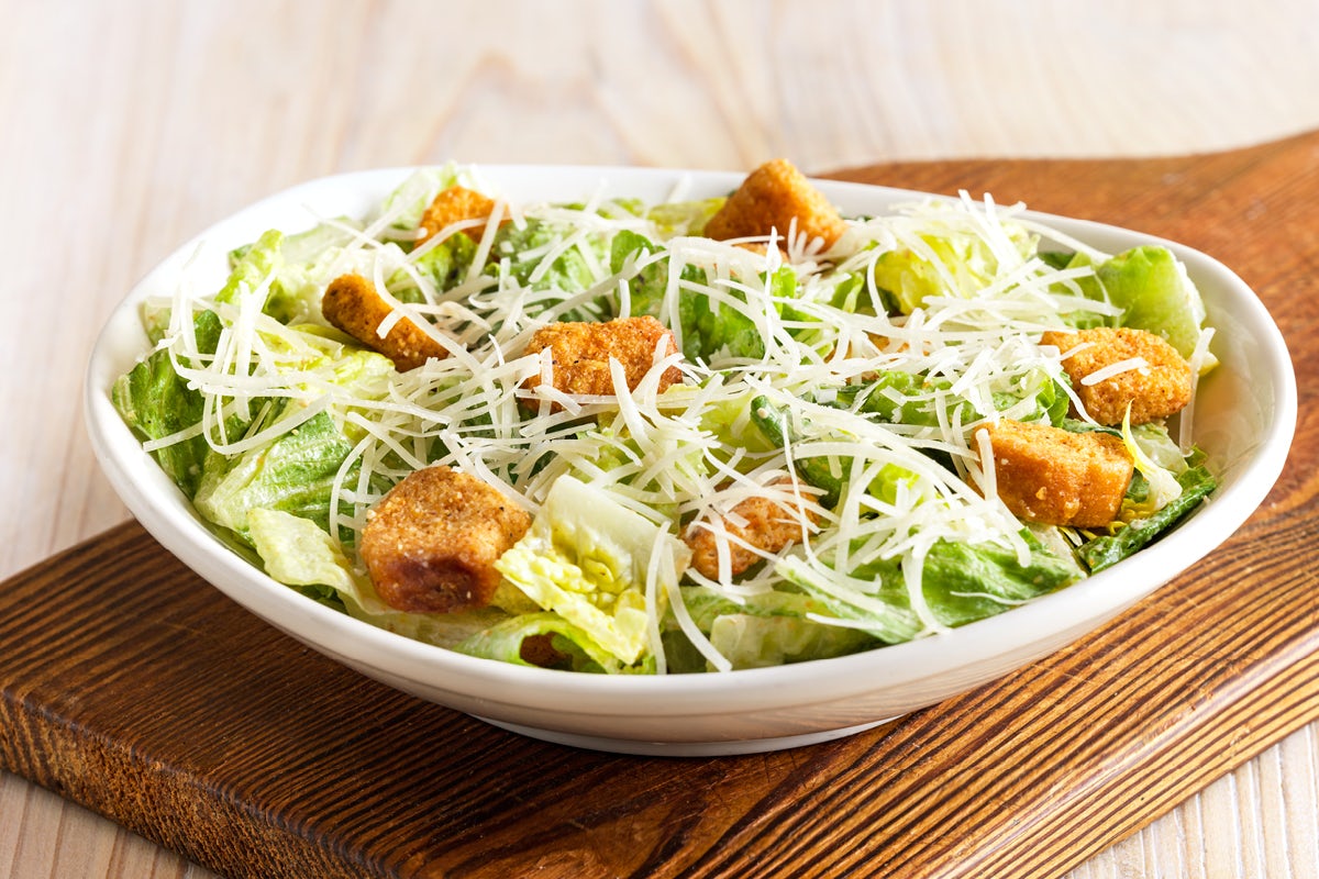 Order Brisbane Caesar Salad food online from Outback Steakhouse store, Douglasville on bringmethat.com