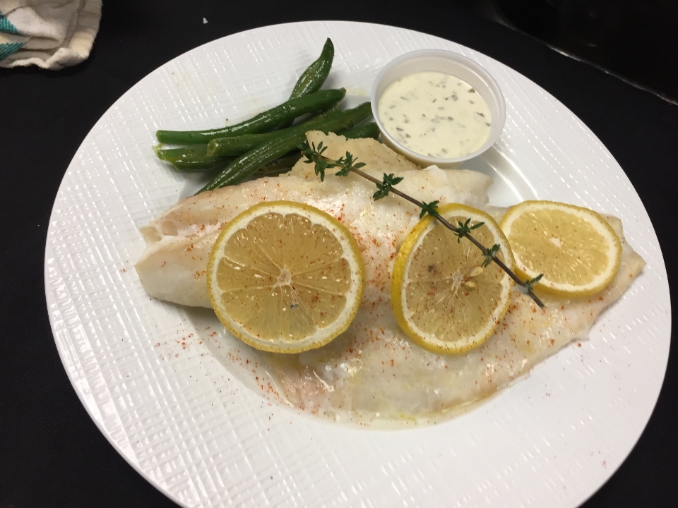 Order Baked Haddock food online from The Grapevine Restaurant & Catering store, Buffalo on bringmethat.com