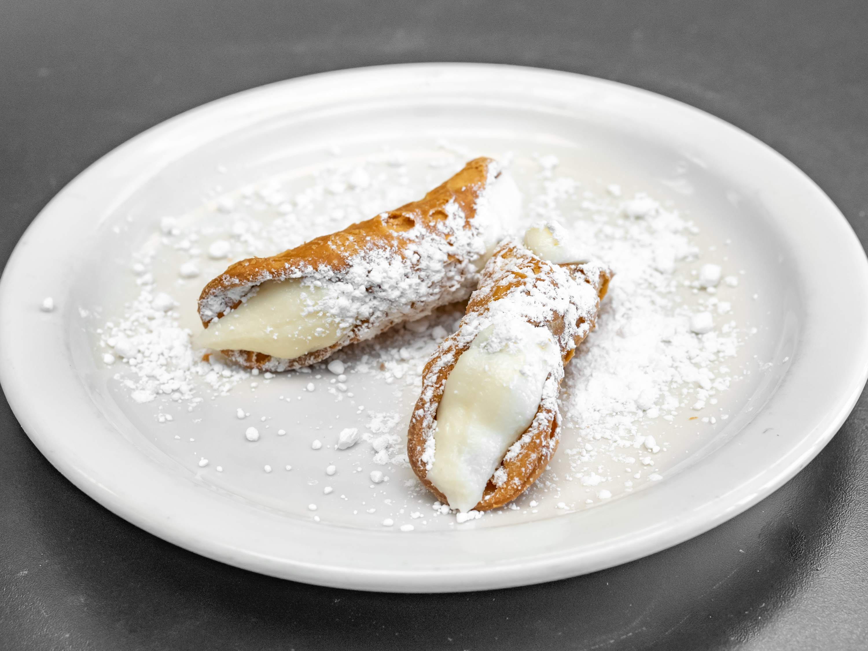 Order Cannoli food online from Tonti's Pizzeria store, Parker on bringmethat.com