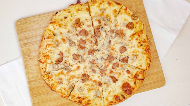 Order Medium - Round food online from Cottage Inn Pizza store, Madison Heights on bringmethat.com