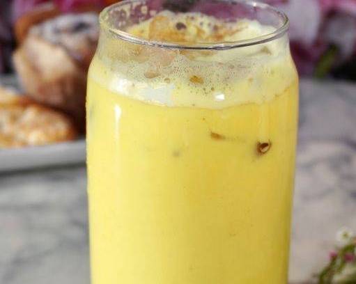 Order Iced Golden Milk Latte  food online from Cafe Sheera Beverly Hills store, Beverly Hills on bringmethat.com