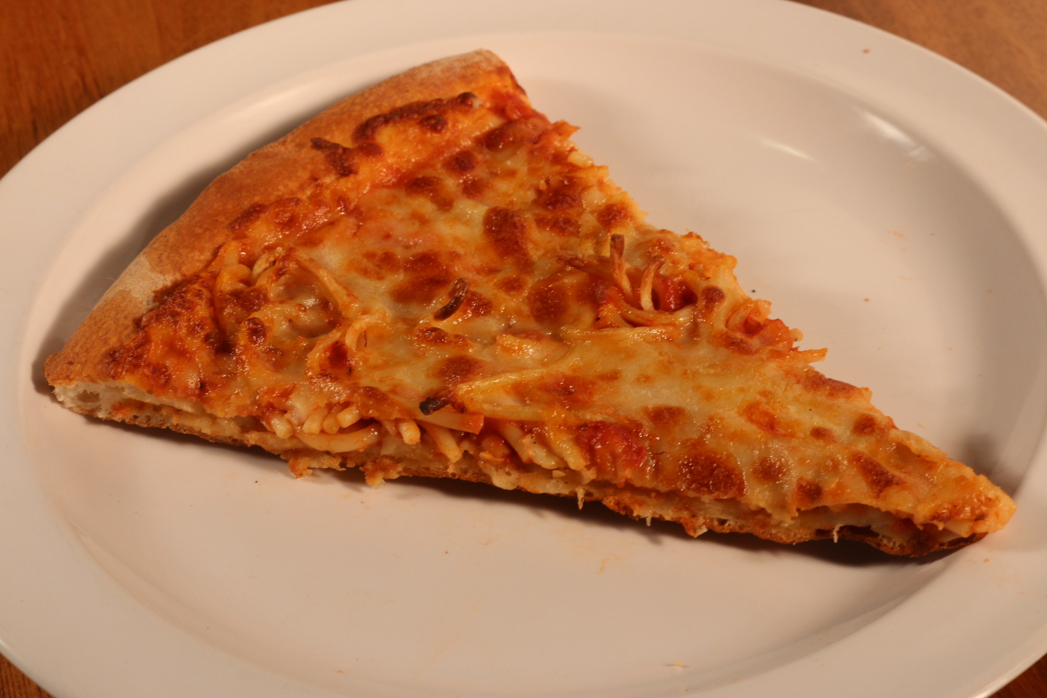 Order Spaghetti Pizza Slice food online from UnCommon Pizza store, Lititz on bringmethat.com