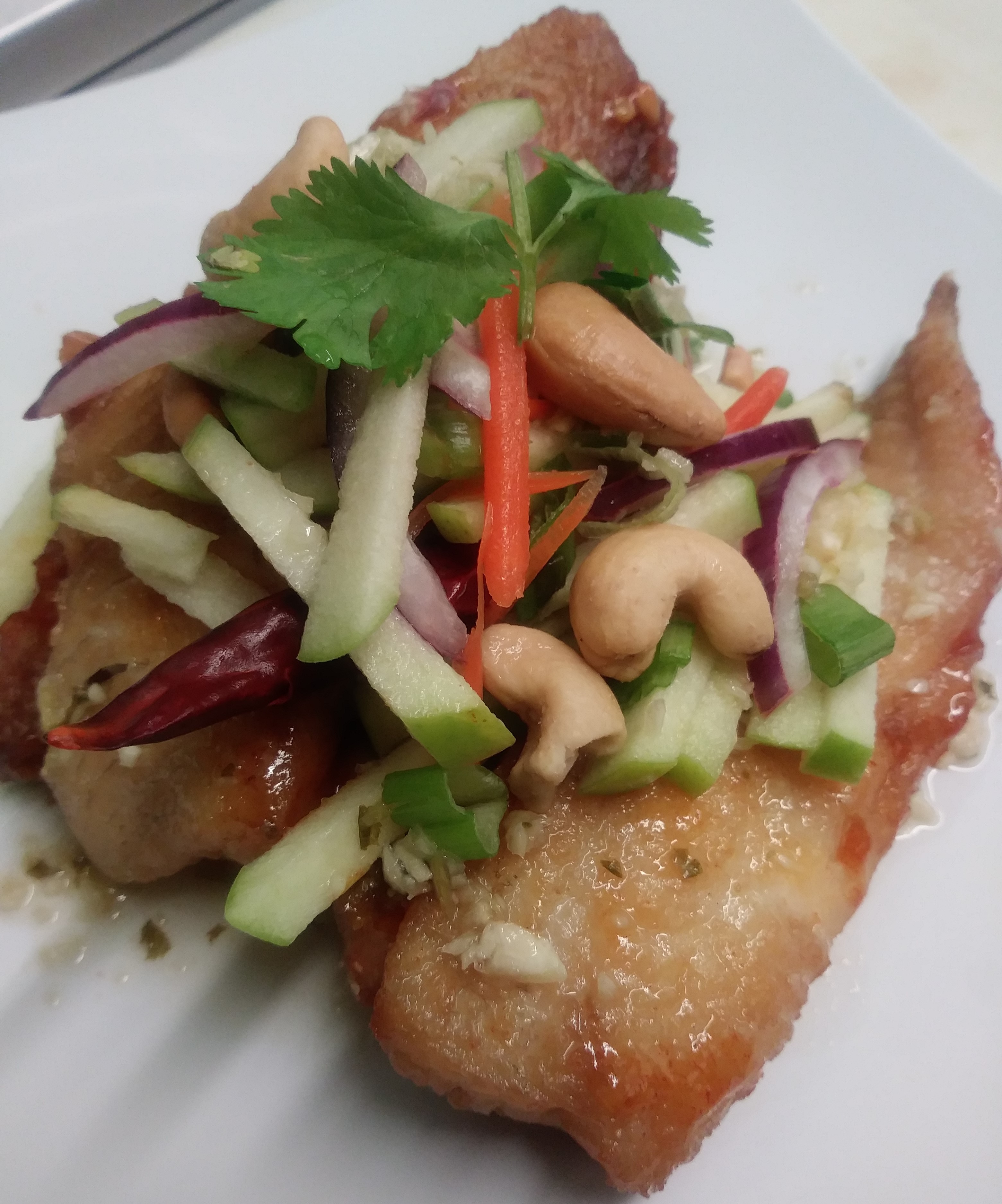 Order Tilapia Fillet Fish with Green Apple Salad food online from Thai Fiesta Cafe store, Paramount on bringmethat.com