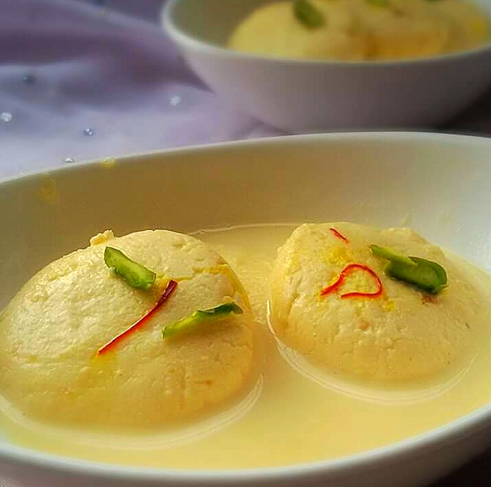 Order Rasmalai (2 PC) food online from Chicago's Pizza With A Twist store, Roseville on bringmethat.com