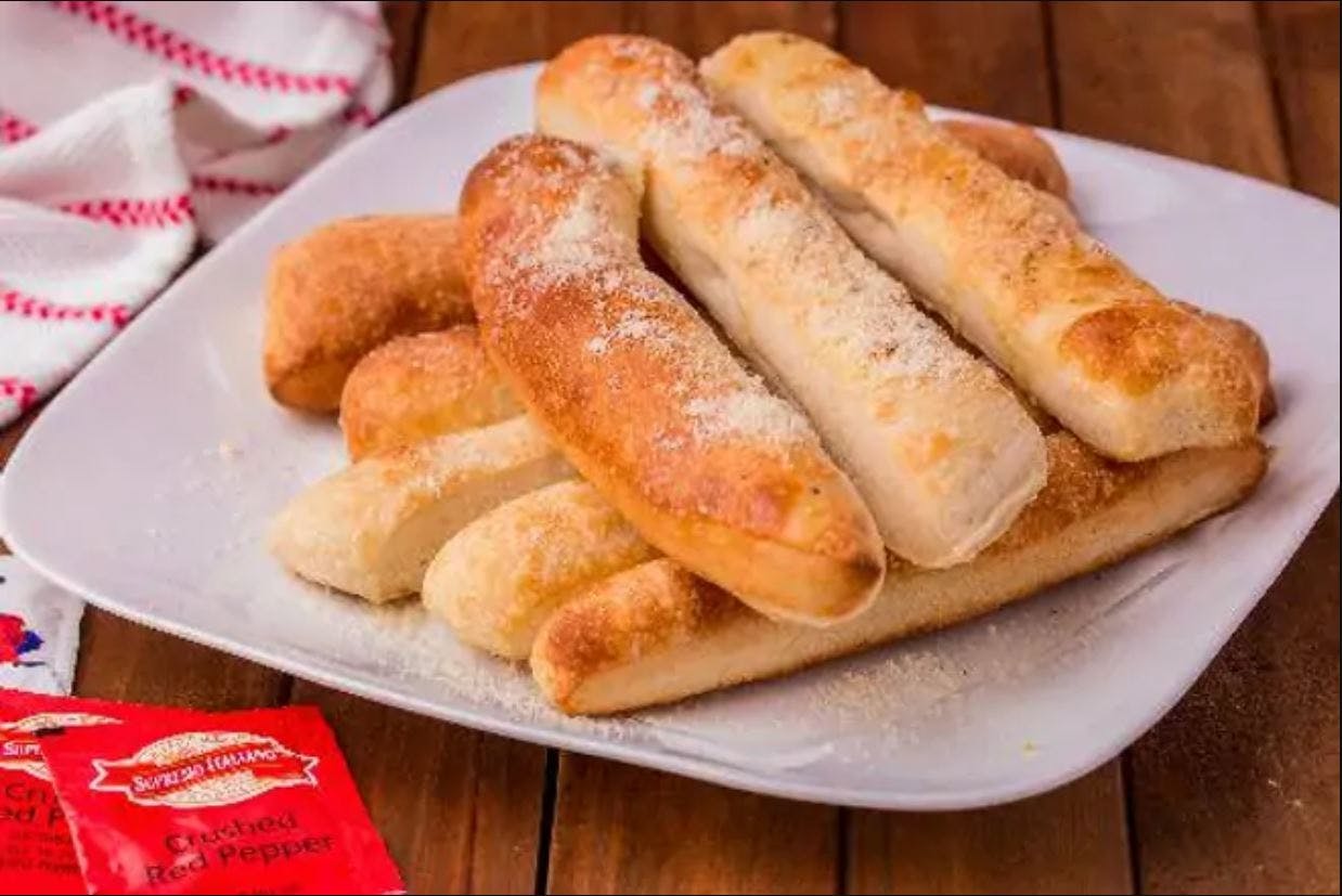 Order Breadsticks - 12 Pieces food online from Pizza Fino store, Houston on bringmethat.com