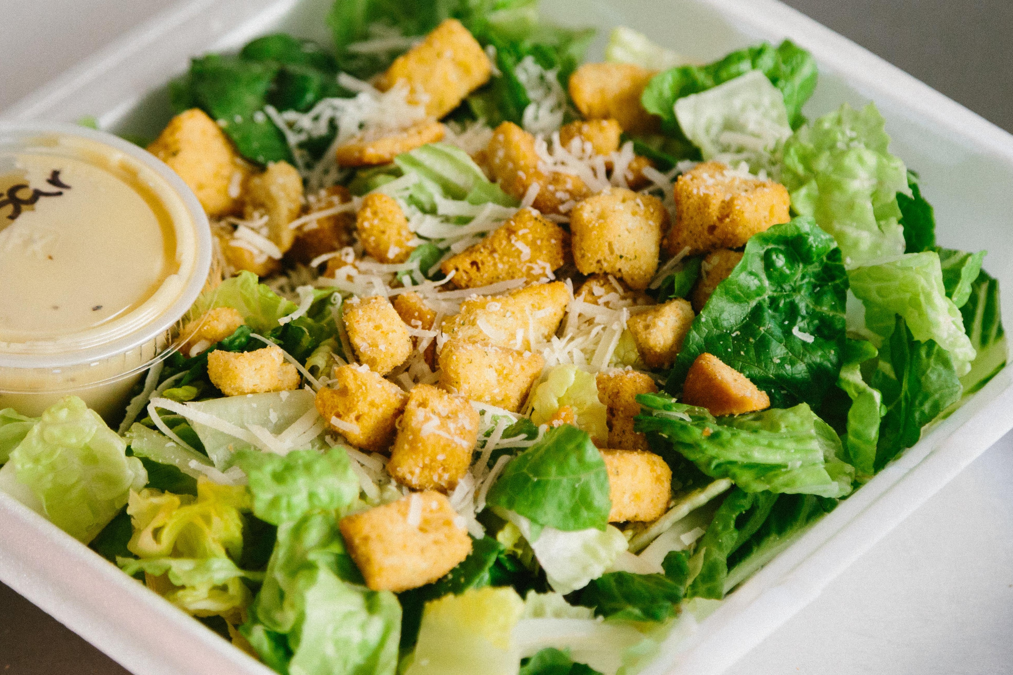 Order Caesar Salad food online from Pisa Pizza store, Countryside on bringmethat.com