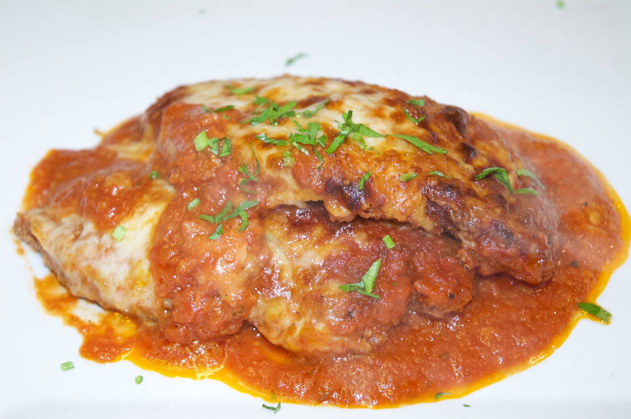 Order Chicken Parmigiana - Chicken & Veal food online from Lombardi Trattoria store, Redding on bringmethat.com