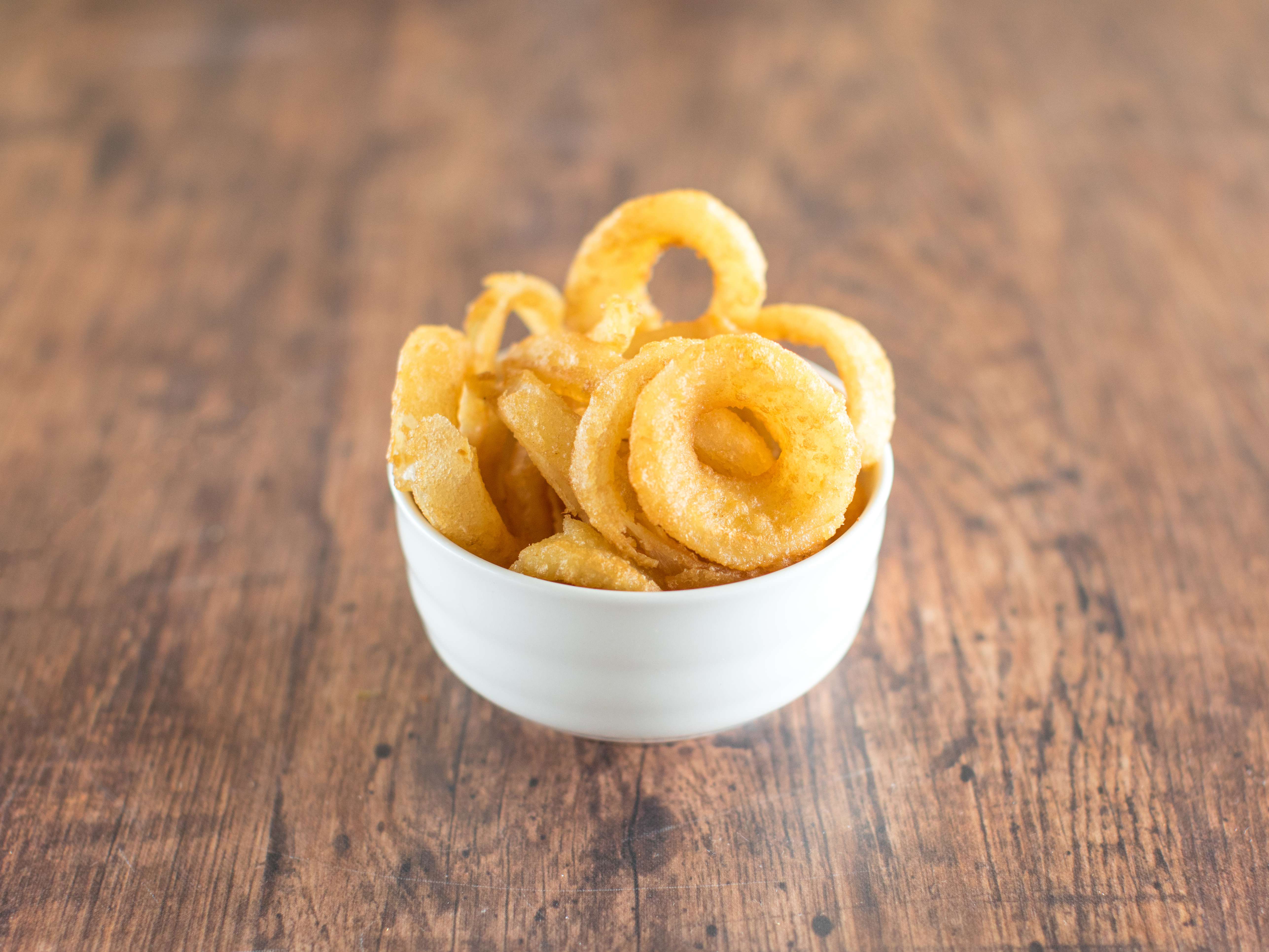 Order Onion Rings food online from Valentino's Italian Pizzeria store, Richmond on bringmethat.com