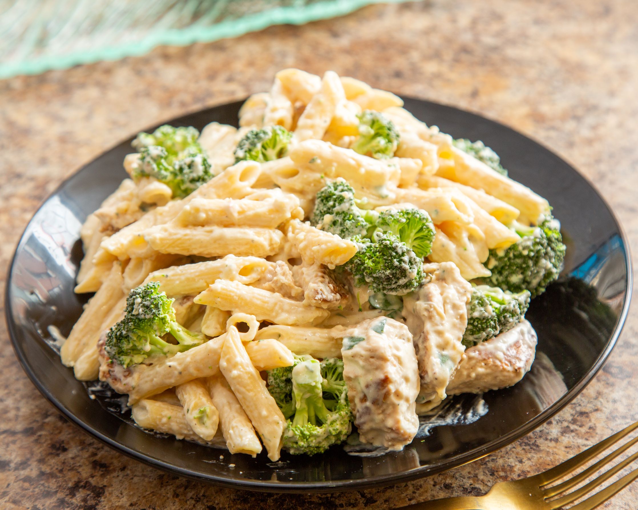 Order Chicken, Pasta and Broccoli food online from Andalus Pizza & Cafe store, Brighton on bringmethat.com