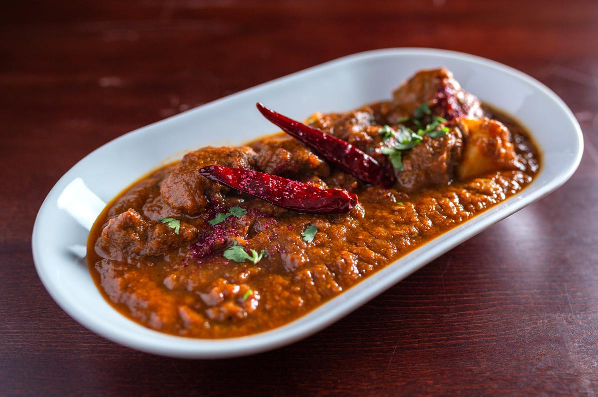 Order Lamb Vindaloo (come with basmati rice) food online from Indian Clay Pot store, Chicago on bringmethat.com