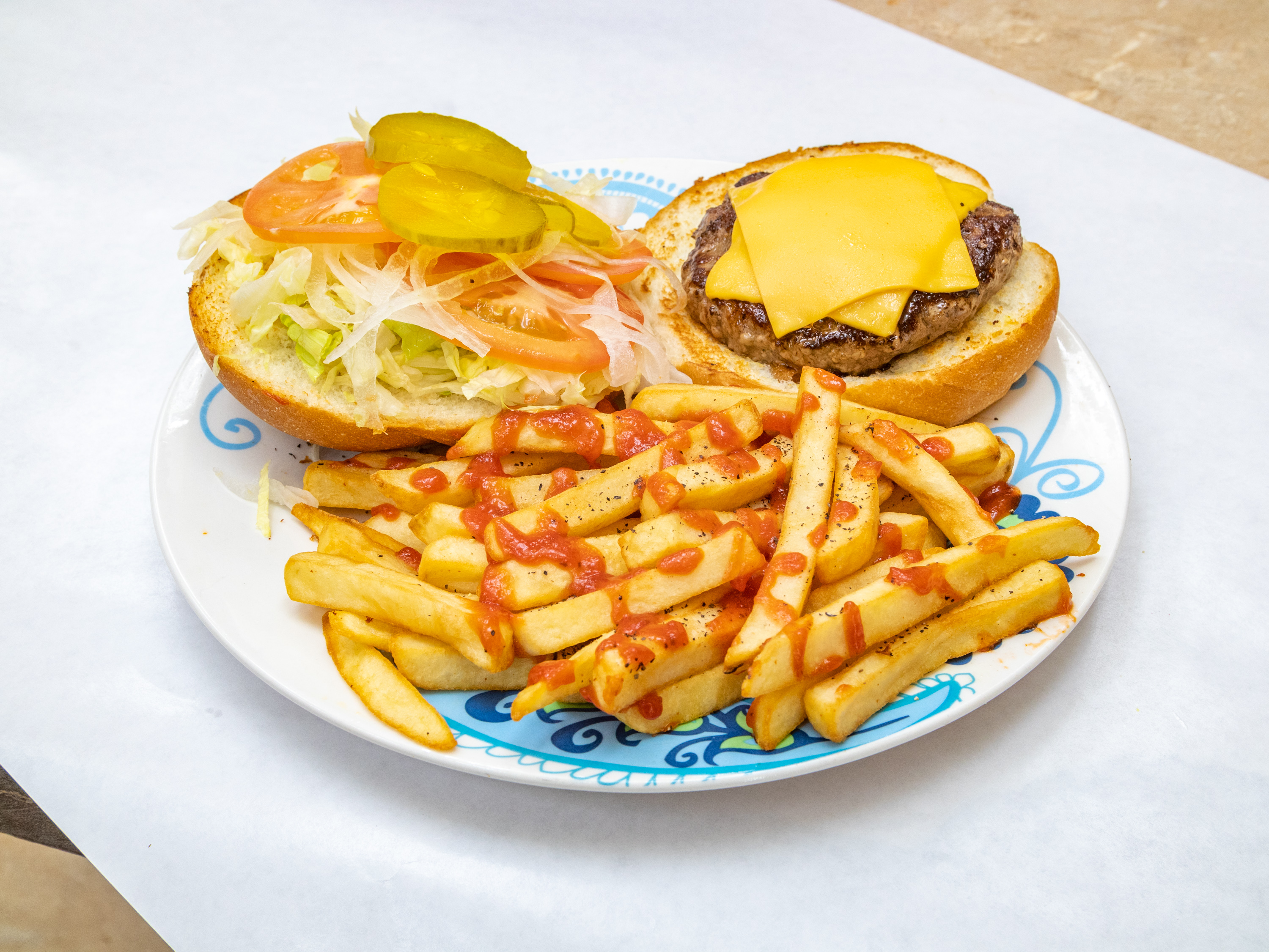 Order Burger with Fries Special food online from One Stop Snacks store, Neptune City on bringmethat.com