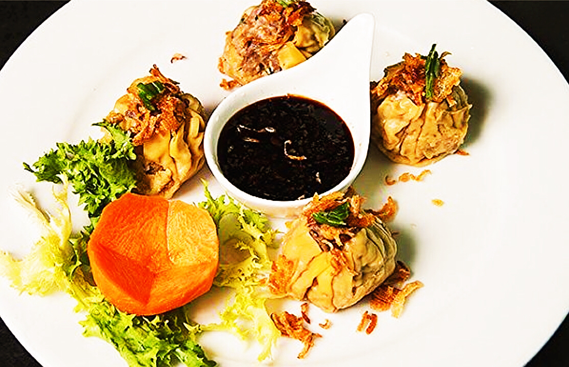 Order 15. Steamed Thai Dumpling food online from Thai Lemongrass & Sakura Sushi store, New York on bringmethat.com