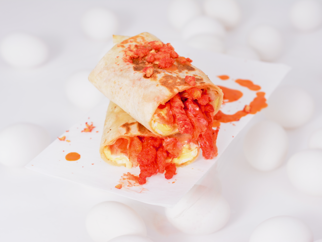 Order Flamin Hot Cheeto Burrito  food online from Breakfast Town store, Troy on bringmethat.com