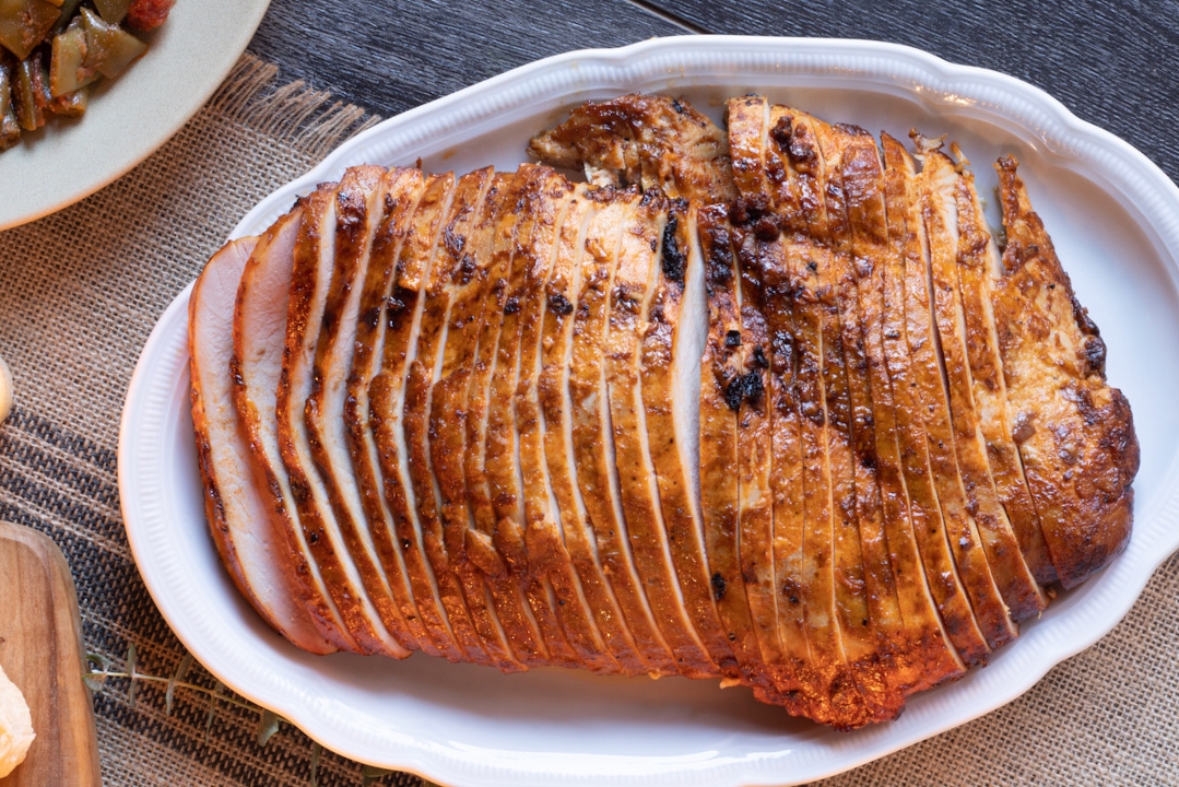 Order Smoked Turkey 1/2 lb food online from Red Hot & Blue store, North Richland Hills on bringmethat.com