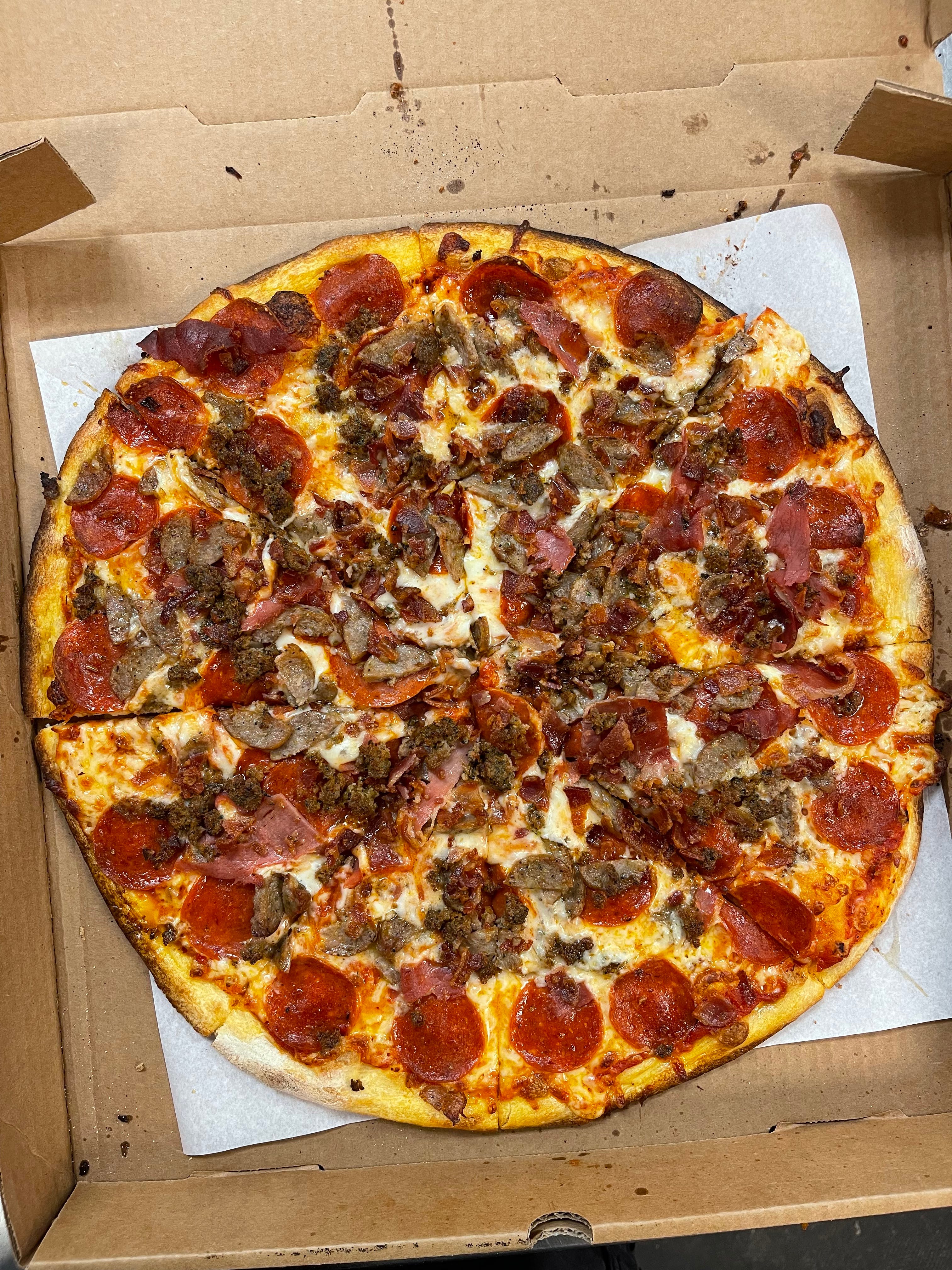 Order The Meat Lover's Pizza - Medium 10'' food online from Dolce To-Go store, Lake Havasu City on bringmethat.com