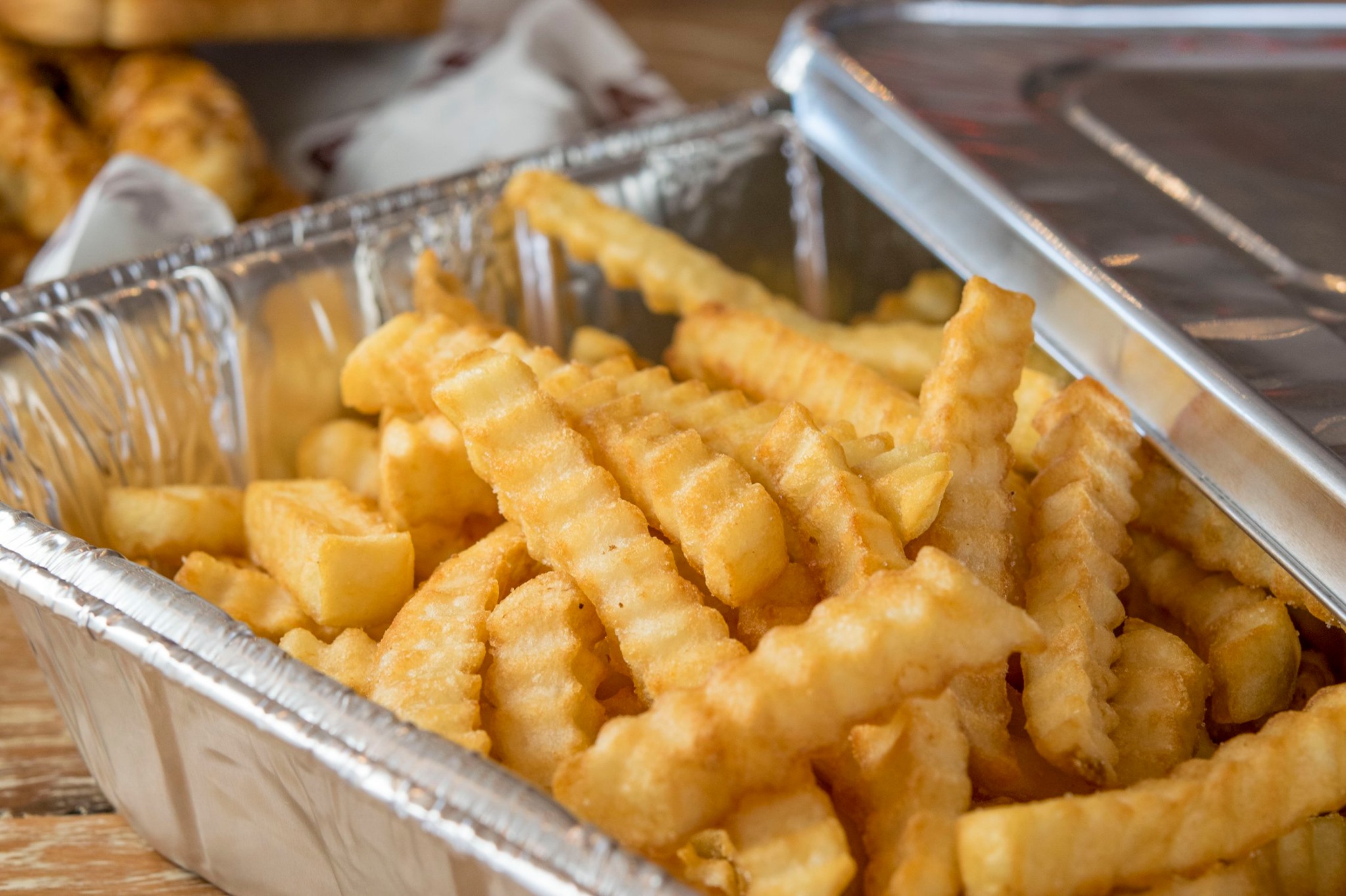 Order Crinkle-Cut Fries food online from Layne Chicken Fingers store, Katy on bringmethat.com