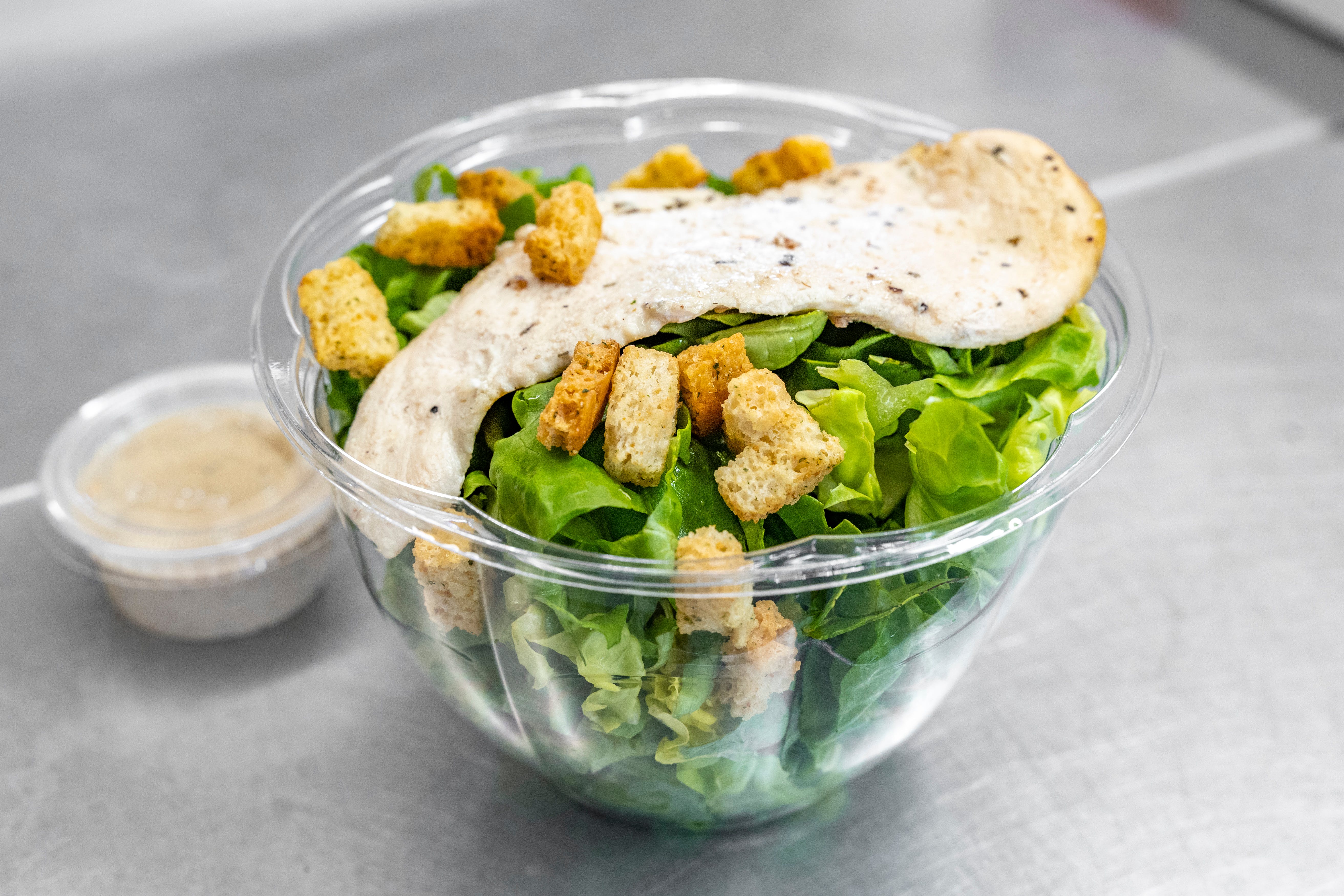 Order Chicken Caesar Salad - Salad food online from Apetidos Pizza store, folsom on bringmethat.com