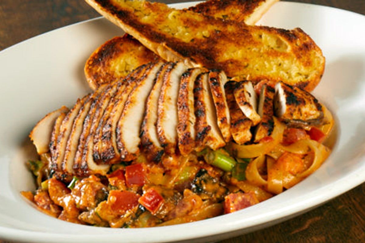 Order CAJUN CHICKEN PASTA food online from Miller Ale House store, Lake Grove on bringmethat.com