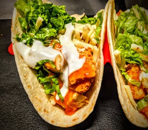 Order Buffalo Chicken food online from Little Rock Taqueria store, Columbus on bringmethat.com