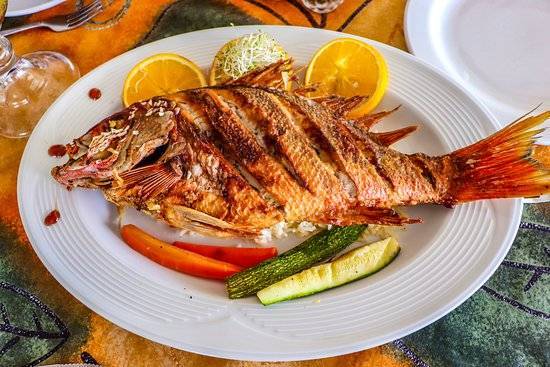 Order Grilled Red snapper (pargo a la parrilla ) food online from Churrasqueria Jc store, Jersey City on bringmethat.com