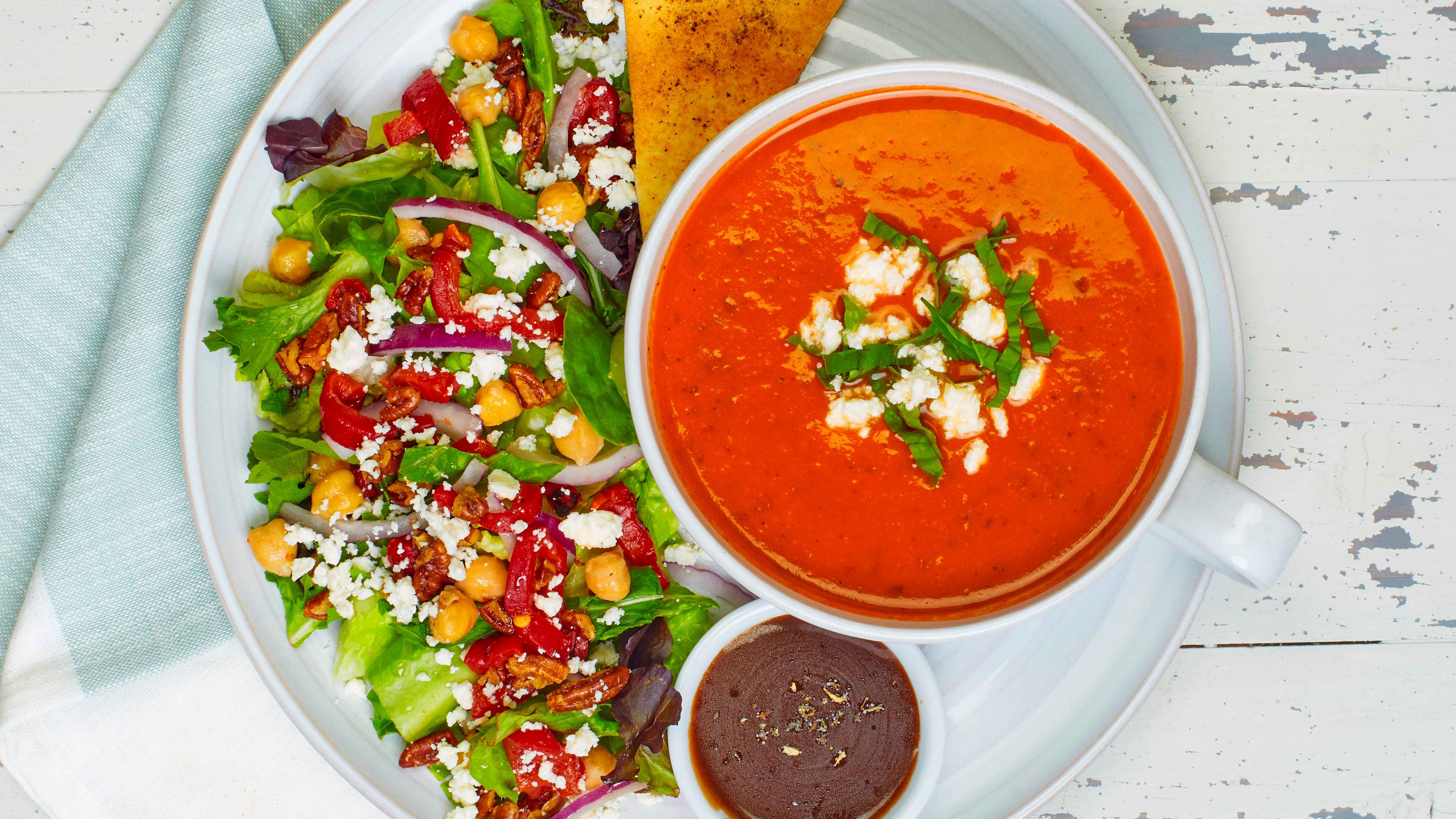 Order Tomato Basil Soup with Greek Salad food online from Taziki's Mediterranean Cafe store, Raleigh on bringmethat.com