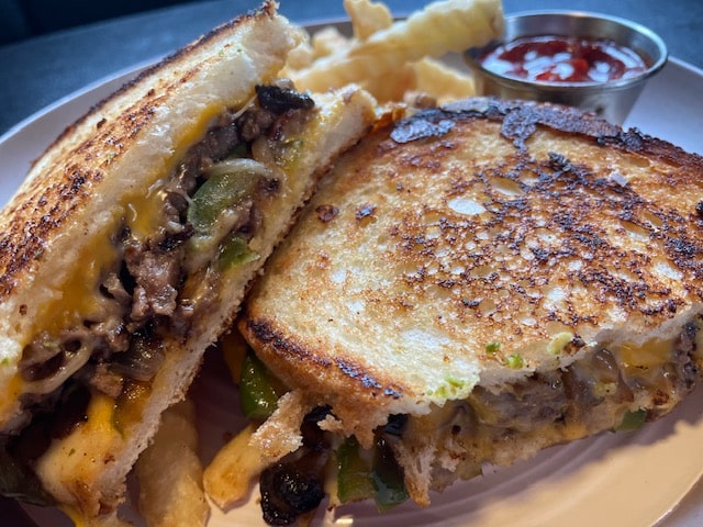 Order Philly Steak Melt - Half food online from Ithaca Ghost Kitchen store, Ithaca on bringmethat.com